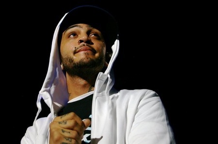 but SOHHcom is reporting that Travie McCoy has been tapped to replace